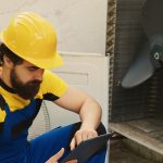 engineer-looks-online-new-blower-fan_482257-75912